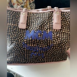 MCM pink bag .. worn. But in good condition